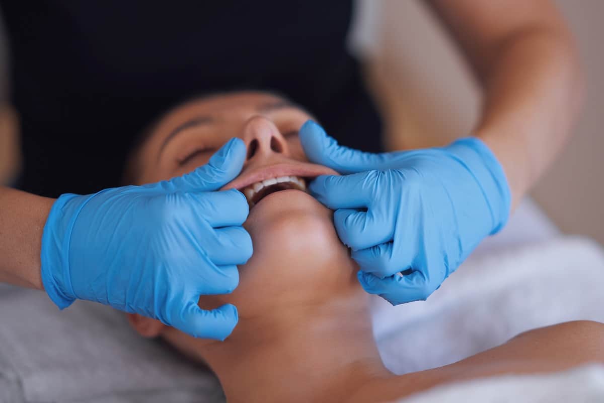 Buccal massage for TMJ and facial tension in Los Angeles